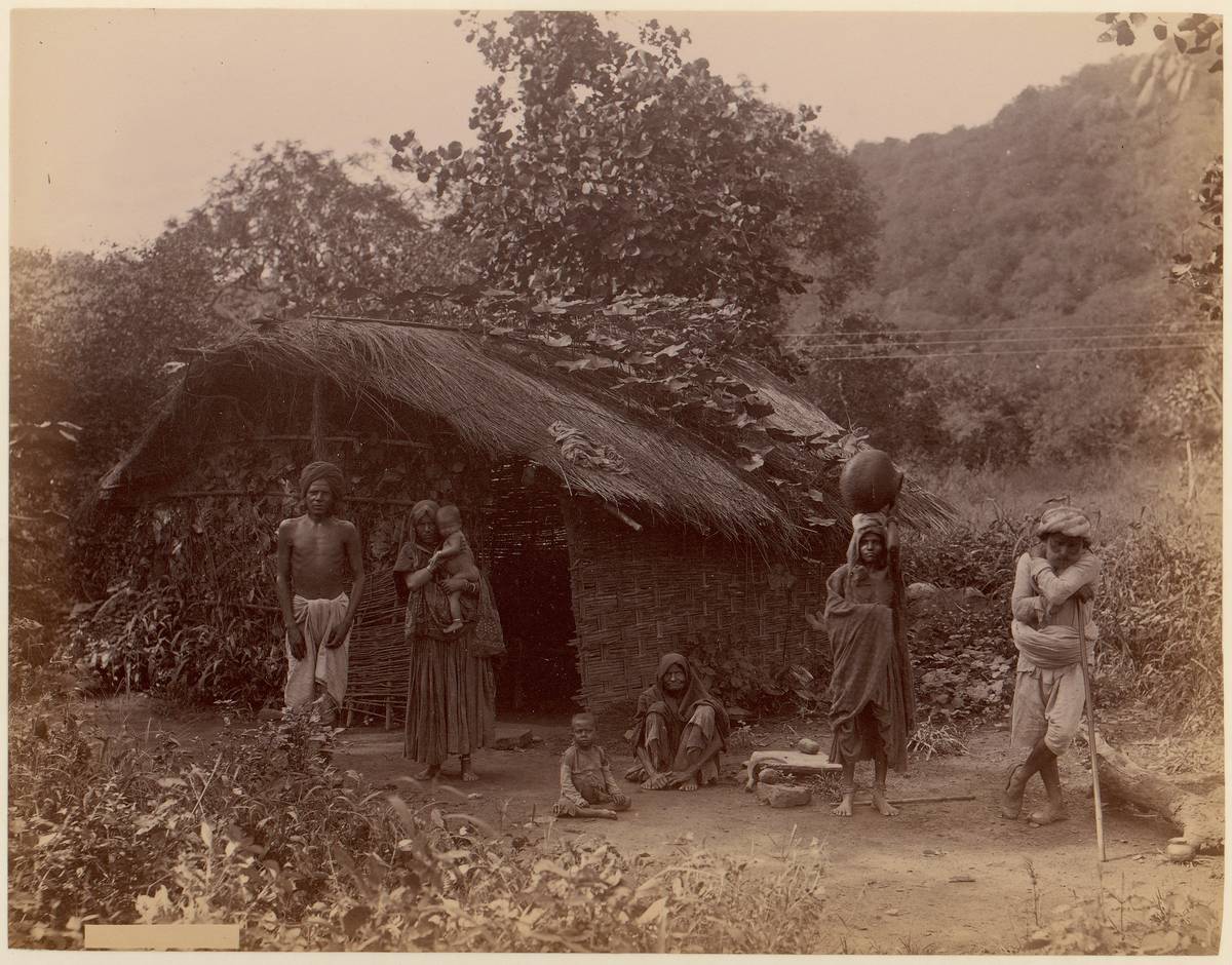 [Thatched House, People in Foreground, Telegraph Lines in Background], albumen silver print from glass negative by Unknown
