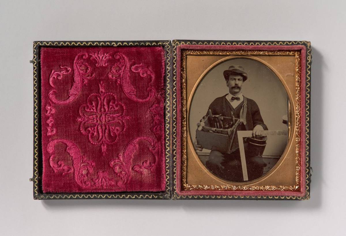 [Carpenter Holding a Bag of Tools and a Square], tintype by Unknown