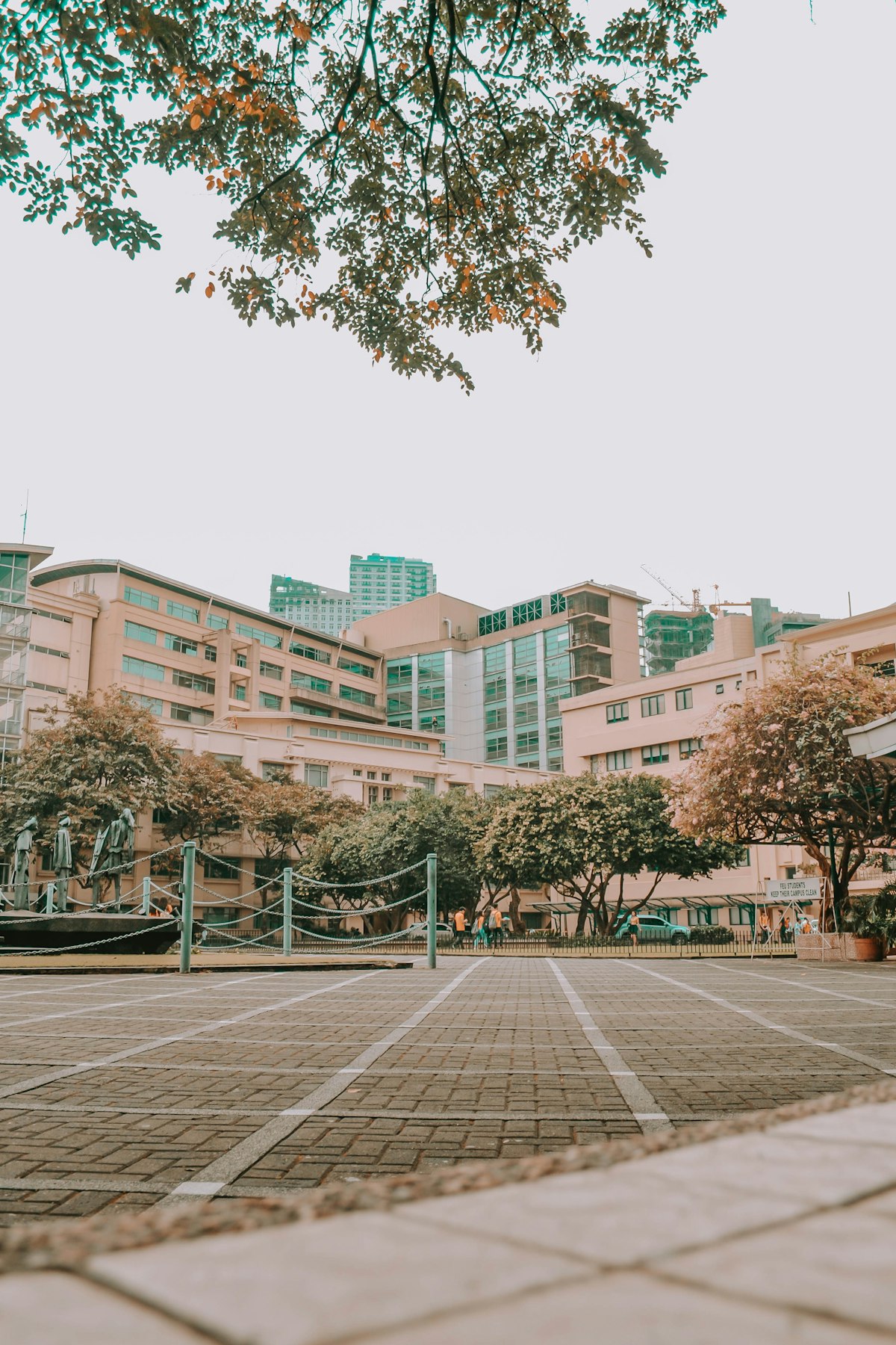 Modern university building exterior surrounded by trees, representing the academic venues convening Caribbean AI governance discussions in 2026