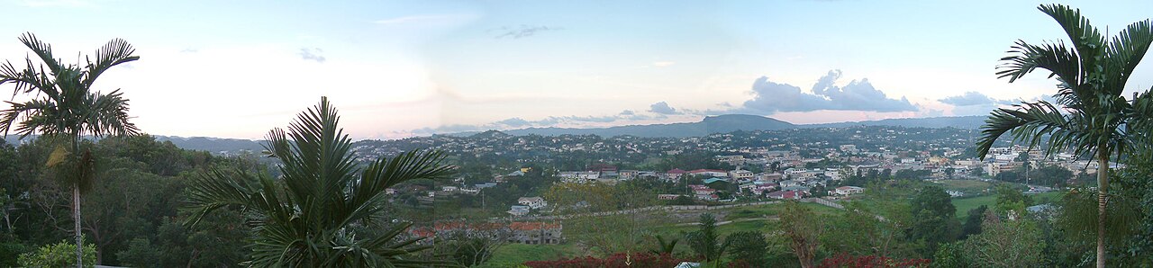 Panoramic view north over the rooftops and green hills of Mandeville in Manchester, Jamaica