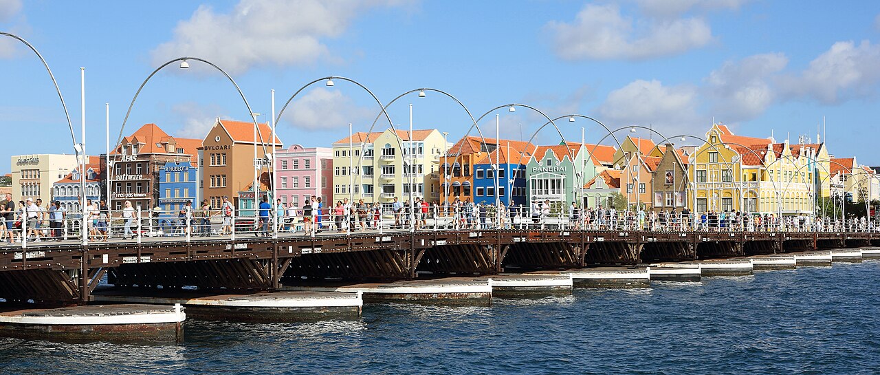 Queen Emma Bridge and the Handelskade waterfront at St Anna Bay in Willemstad, a Caribbean port city